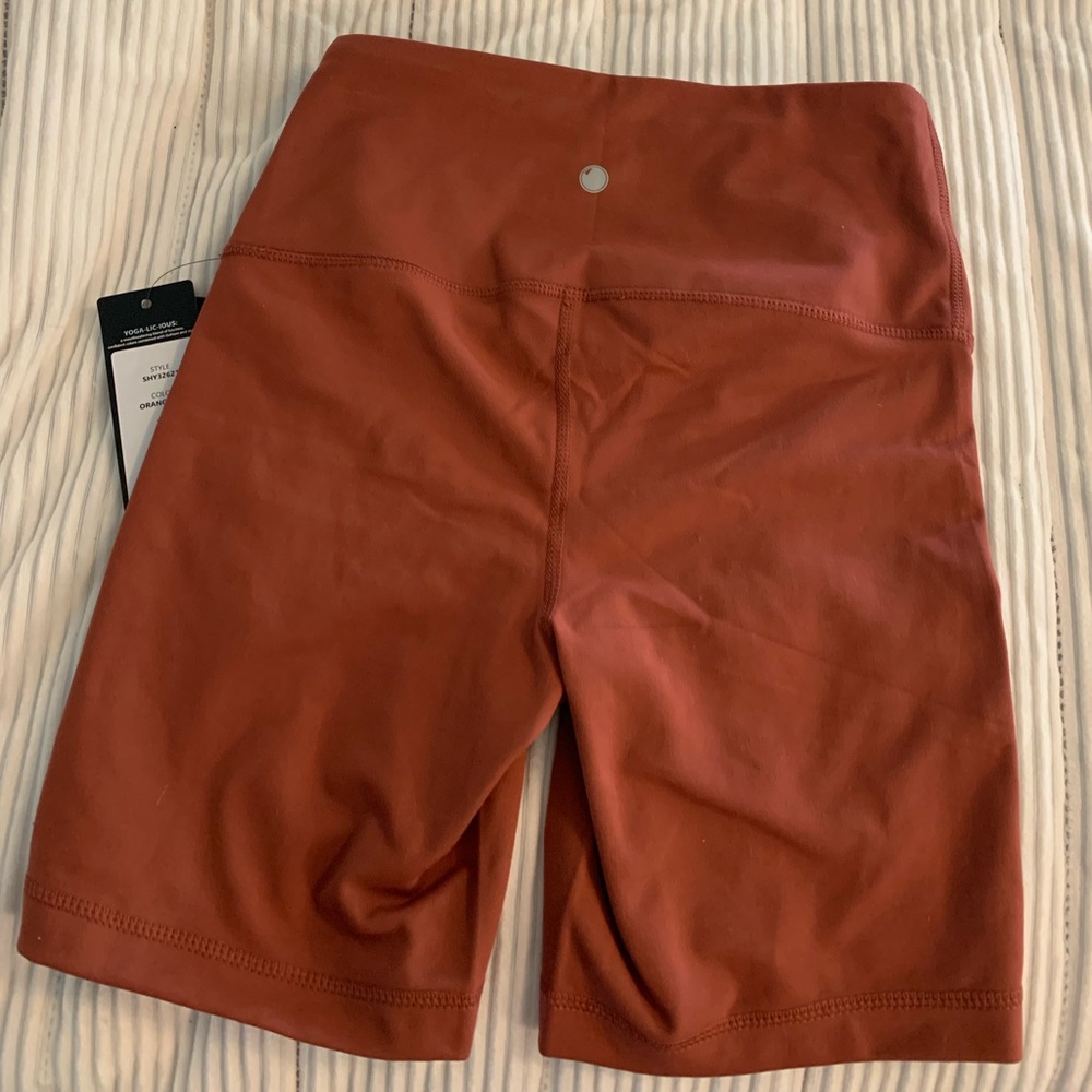 Brand new orange biker shorts
